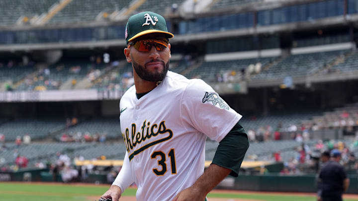 Jul 21, 2024; Oakland, California, USA; Oakland Athletics third baseman Abraham Toro (31) jogs onto the field before the game against the Los Angeles Angels at Oakland-Alameda County Coliseum. Mandatory Credit: Darren Yamashita-Imagn Images