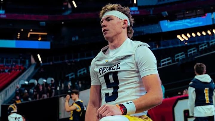 Ben Musser kneeling before a game