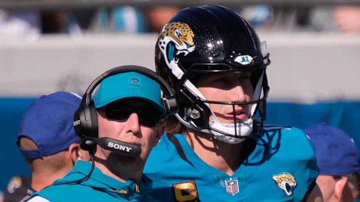 Jacksonville Jaguars head coach Liam Coen talks with Jacksonville Jaguars quarterback Trevor Lawrence (16) during the first quarter during an NFL football game at EverBank Stadium, Sunday, Dec. 14, 2025, in Jacksonville, Fla. [Doug Engle/Florida Times-Union]