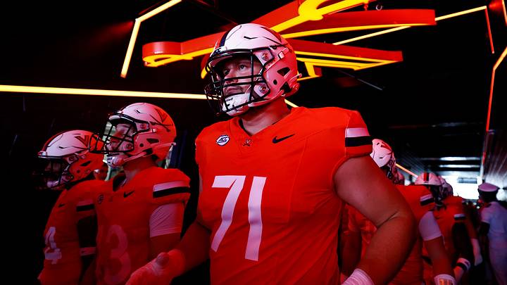 Right tackle Monroe Mills made his Virginia debut Saturday.