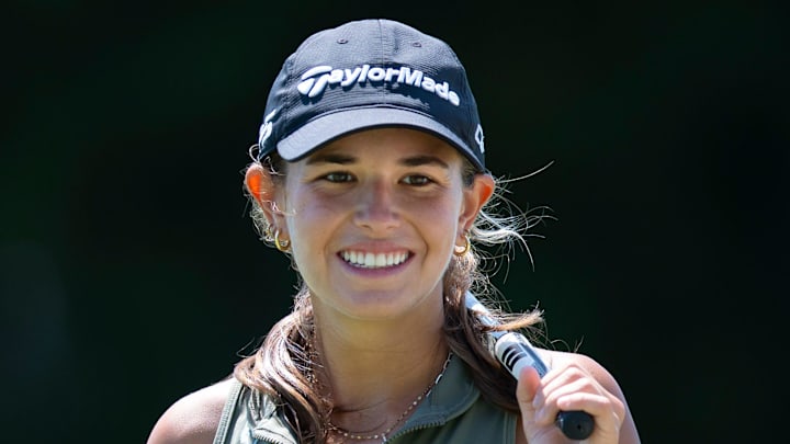 Kai Trump smiles after making a putt at the 41st Nicklaus Junior Championship at the Tequesta Country Club on June 23, 2025 in Tequesta, Florida.