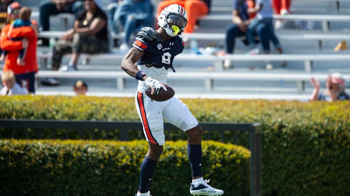 Auburn Tigers wide receiver Cam Coleman (8) celebrates his touchdown catch during the A-Day spring