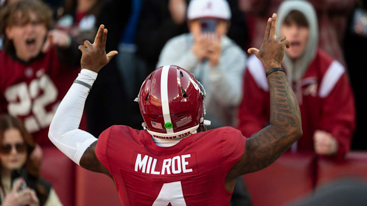 Alabama Crimson Tide quarterback Jalen Milroe (4) pumps up the crowd before Auburn Tigers take on Alabama Crimson Tide at Bryant-Denny Stadium in Tuscaloosa, Ala., on Saturday, Nov. 30, 2024. Alabama Crimson Tide leads Auburn Tigers 14-6 at halftime.