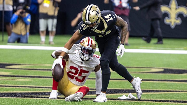 New Orleans Saints wide receiver Devaughn Vele (14) reacts to scoring a touchdown against San Francisco 49ers safety Jason Pinnock (25).