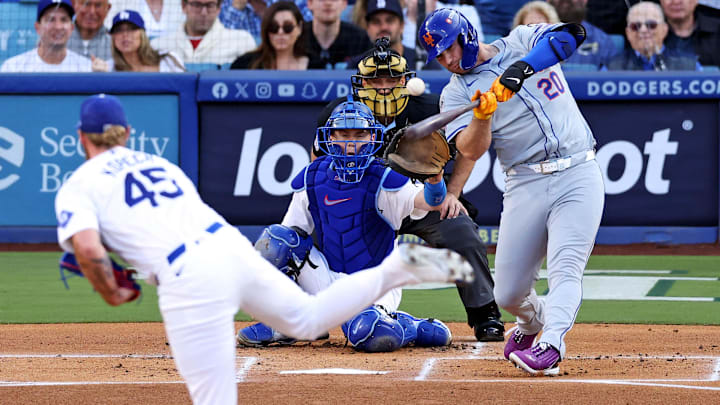 Oct 20, 2024; Los Angeles, California, USA; New York Mets first base Pete Alonso (20) hits and reaches first base on an error during the first inning against the Los Angeles Dodgers during game six of the NLCS for the 2024 MLB playoffs at Dodger Stadium. Mandatory Credit: Jason Parkhurst-Imagn Images Oct 20, 2024; Los Angeles, California, USA; New York Mets first base Pete Alonso (20) hits and reaches first base on an error during the first inning against the Los Angeles Dodgers during game six of the NLCS for the 2024 MLB playoffs at Dodger Stadium. Mandatory Credit: Jason Parkhurst-Imagn Images