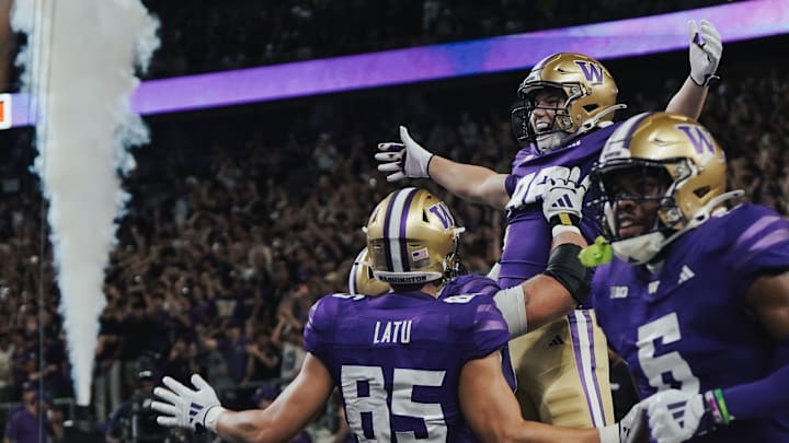 Decker DeGraaf celebrates his 33-yard touchdown catch on his first UW play. Decker DeGraaf celebrates his 33-yard touchdown catch on his first UW play.