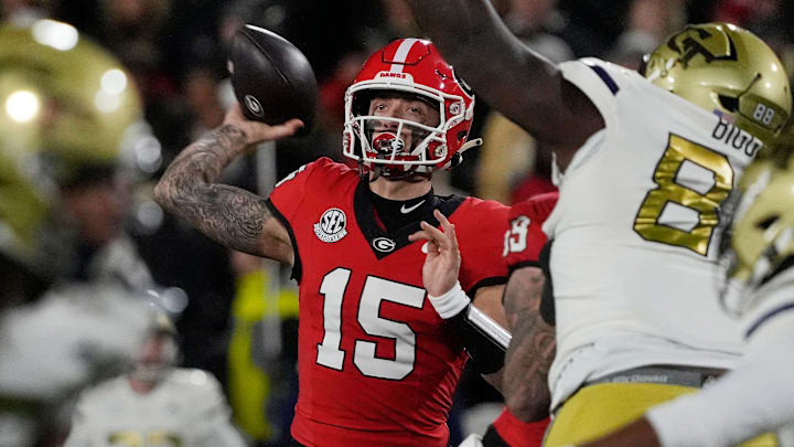 Georgia quarterback Carson Beck (15) throws the ball during the first half of a NCAA college football game against Georgia Tech in Athens, Ga., on Friday, Nov. 29, 2024.