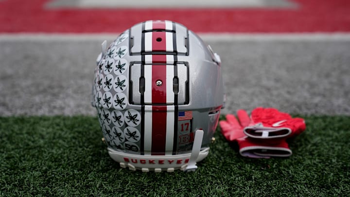 An Ohio State Buckeyes helmet sits on the sideline prior to the NCAA football game against the Indiana Hoosiers at Ohio Stadium in Columbus on Saturday, Nov. 23, 2024. An Ohio State Buckeyes helmet sits on the sideline prior to the NCAA football game against the Indiana Hoosiers at Ohio Stadium in Columbus on Saturday, Nov. 23, 2024.