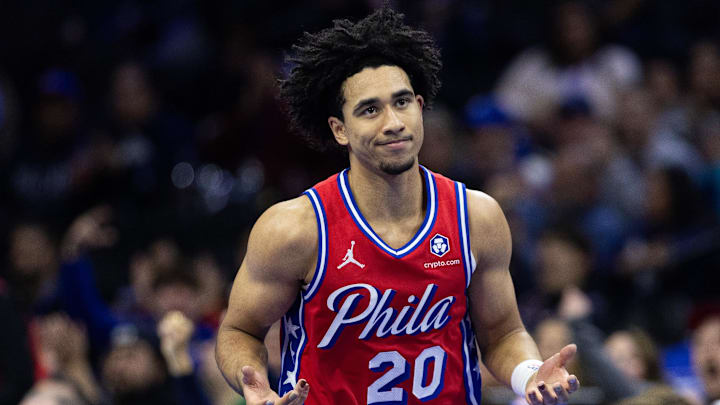 Nov 22, 2024; Philadelphia, Pennsylvania, USA; Philadelphia 76ers guard Jared McCain (20) reacts to his three pointer against the Brooklyn Nets during the first quarter at Wells Fargo Center. Mandatory Credit: Bill Streicher-Imagn Images