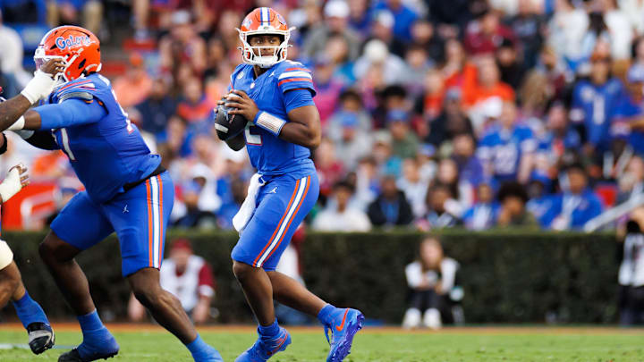 Nov 29, 2025; Gainesville, Florida, USA; Florida Gators quarterback DJ Lagway (2) looks to throw against the Florida State Seminoles during the first half at Ben Hill Griffin Stadium. Mandatory Credit: Matt Pendleton-Imagn Images