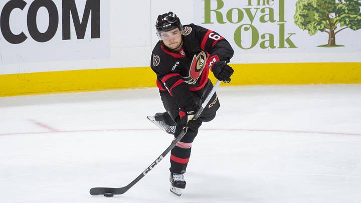 Ottawa Senators defenseman Calen Addison (6) shoots the puck in the third period against the Buffalo Sabres at the Canadian Tire Centre. Mandatory Credit: Marc DesRosiers-Imagn Images