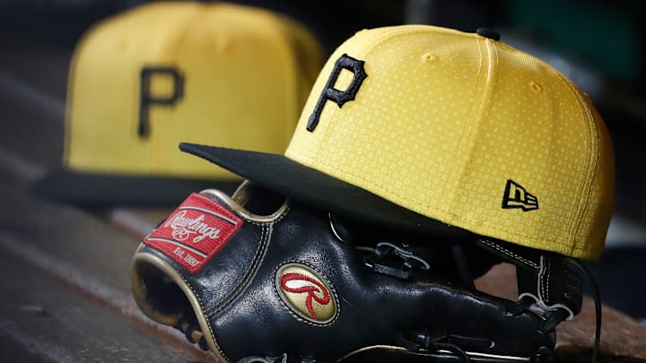 Pittsburgh Pirates hats and gloves in the dugout against the New York Yankees during the sixth inning at PNC Park. 