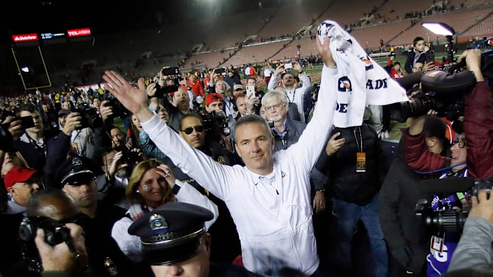 In his final game as the Ohio State Buckeyes head coach, Urban Meyer salutes the fans as he leaves the field following the 28-23 win over the Washington Huskies in the Rose Bowl in Pasadena, Calif. on Jan. 1, 2019. [Adam Cairns/Dispatch]