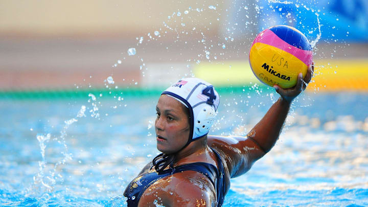 June 24, 2010; Stanford, CA, USA; USA player Brenda Villa (4) controls the ball during the third quarter in the 2010 USA Women's Water Polo National Team exhibition game against China at Avery Aquatic Center. USA defeated the China 12-8. Mandatory Credit: Kyle Terada-Imagn Images
