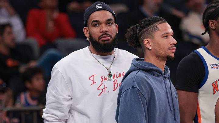 Apr 12, 2026; New York, New York, USA; New York Knicks center Karl-Anthony Towns, far left, and Josh Hart, center-left look on with center Ariel Hukporti (55) and guard Miles McBride (2) during the second half against the Charlotte Hornets at Madison Square Garden. Mandatory Credit: Vincent Carchietta-Imagn Images