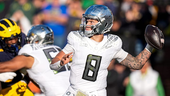 Oregon quarterback Dillon Gabriel makes a pass against Michigan during the first half at Michigan Stadium in Ann Arbor.