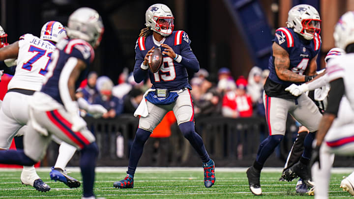 Jan 5, 2025; Foxborough, Massachusetts, USA; New England Patriots quarterback Joe Milton III (19) throws a pass against the Buffalo Bills in the first half at Gillette Stadium. Mandatory Credit: David Butler II-Imagn Images