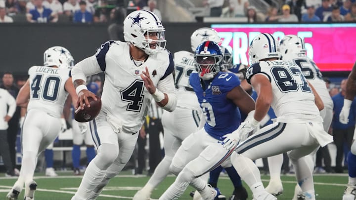 Sep 26, 2024; East Rutherford, New Jersey, USA; Dallas Cowboys quarterback Dak Prescott (4) rolls out against the New York Giants in the first quarter at MetLife Stadium. Mandatory Credit: Robert Deutsch-Imagn Images Sep 26, 2024; East Rutherford, New Jersey, USA; Dallas Cowboys quarterback Dak Prescott (4) rolls out against the New York Giants in the first quarter at MetLife Stadium. Mandatory Credit: Robert Deutsch-Imagn Images