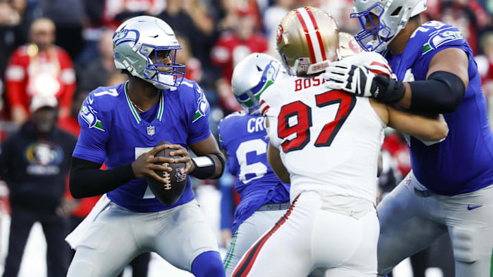 Oct 10, 2024; Seattle, Washington, USA; Seattle Seahawks quarterback Geno Smith (7) looks to pass against the San Francisco 49ers during the first quarter at Lumen Field. Mandatory Credit: Joe Nicholson-Imagn Images Oct 10, 2024; Seattle, Washington, USA; Seattle Seahawks quarterback Geno Smith (7) looks to pass against the San Francisco 49ers during the first quarter at Lumen Field. Mandatory Credit: Joe Nicholson-Imagn Images