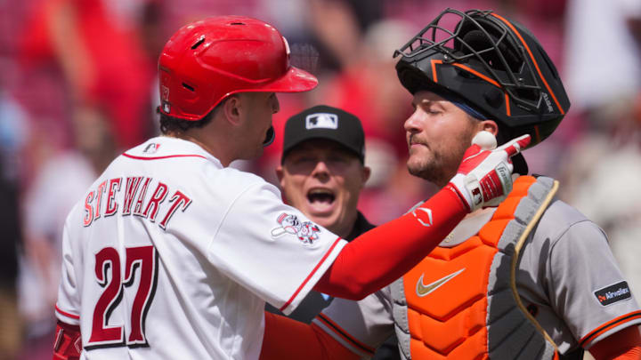 Apr 16, 2026; Cincinnati, Ohio, USA; Cincinnati Reds third baseman Sal Stewart (27) exchanges words with San Francisco Giants catcher Patrick Bailey (14) after the final out of the ninth inning at Great American Ball Park. Mandatory Credit: Aaron Doster-Imagn Images