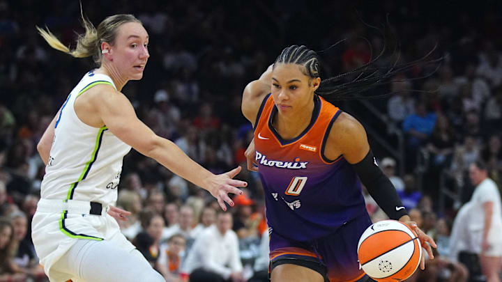 Mercury forward Satou Sabally (0) dribbles against the Lynx forward Alanna Smith (8) at PHX Arena in Phoenix, Ariz., on May 30, 2025.