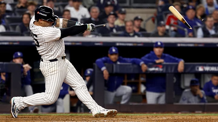 Oct 30, 2024; New York, New York, USA; New York Yankees second baseman Gleyber Torres (25) breaks his bat on a ground out during the seventh inning against the Los Angeles Dodgers in game five of the 2024 MLB World Series at Yankee Stadium. Mandatory Credit: Vincent Carchietta-Imagn Images