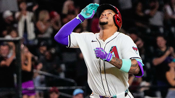 Sep 2, 2025; Phoenix, Arizona, USA; Arizona Diamondbacks second base Ketel Marte (4) celebrates his three run home run in the seventh inning of the game between Arizona Diamondbacks and Texas Rangers at Chase Field. Mandatory Credit: Arianna Grainey-Imagn Images
