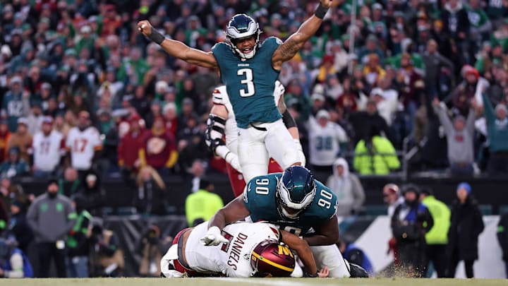 Jan 26, 2025; Philadelphia, PA, USA; Philadelphia Eagles linebacker Nolan Smith Jr. (3) celebrates as defensive tackle Jordan Davis (90) sacks Washington Commanders quarterback Jayden Daniels (5) during the second half in the NFC Championship game at Lincoln Financial Field. Mandatory Credit: Bill Streicher-Imagn Images