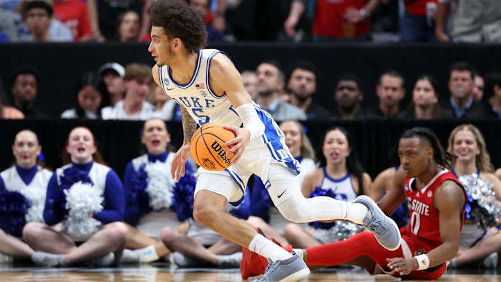 Mar 31, 2024; Dallas, TX, USA; Duke Blue Devils guard Tyrese Proctor (5) controls the ball against