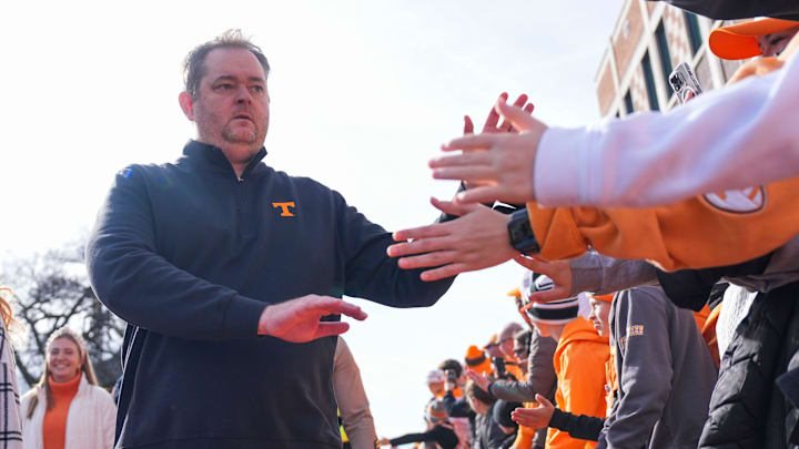 Tennessee coach Josh Heupel high-fives fans at the Vol Walk before a NCAA football game between Tennessee and Vanderbilt at Neyland Stadium in Knoxville, Tenn., on Nov. 29, 2025. Tennessee coach Josh Heupel high-fives fans at the Vol Walk before a NCAA football game between Tennessee and Vanderbilt at Neyland Stadium in Knoxville, Tenn., on Nov. 29, 2025.