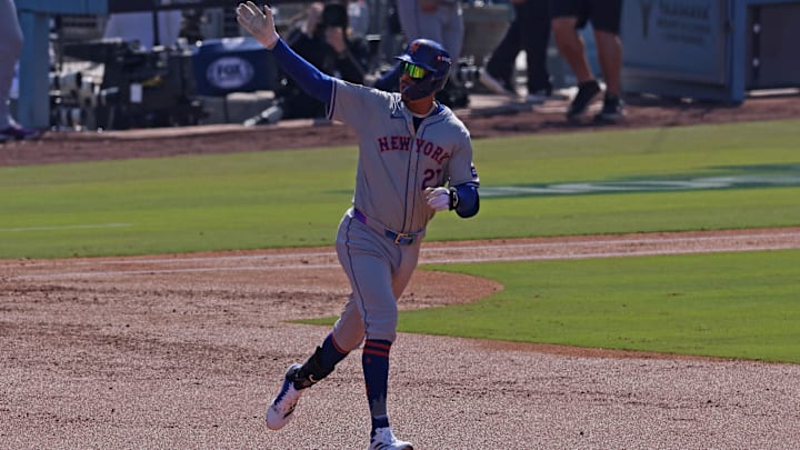 New York Mets third base Mark Vientos reacts after hitting a grand slam during Game 2 of a National League Championship Series against the Los Angeles Dodgers on Monday at Dodger Stadium. New York Mets third base Mark Vientos reacts after hitting a grand slam during Game 2 of a National League Championship Series against the Los Angeles Dodgers on Monday at Dodger Stadium.