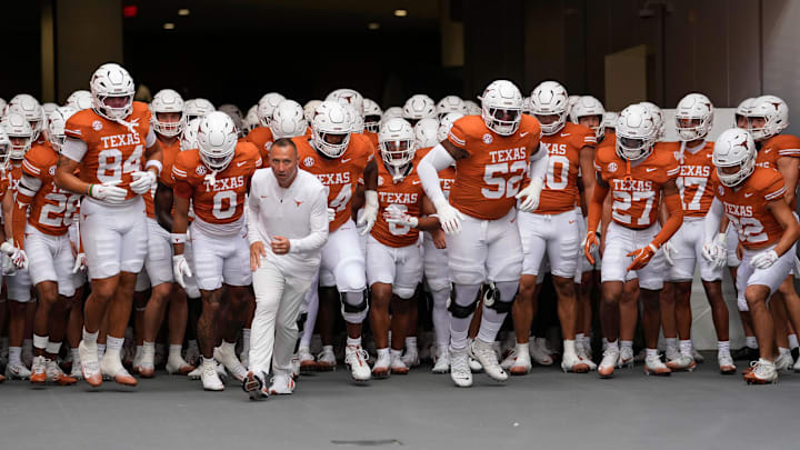 Sep 20, 2025; Austin, Texas, USA; Texas Longhorns head coach Steve Sarkisian leads his team onto the field before a game against the Sam Houston State Bearkats.
