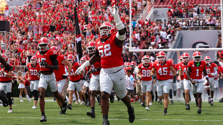 Sep 6, 2025; Athens, Georgia, USA; Georgia Bulldogs defensive lineman Christen Miller (52) runs on the field before a game against the Austin Peay Governors at Sanford Stadium. Mandatory Credit: Brett Davis-Imagn Images Sep 6, 2025; Athens, Georgia, USA; Georgia Bulldogs defensive lineman Christen Miller (52) runs on the field before a game against the Austin Peay Governors at Sanford Stadium. Mandatory Credit: Brett Davis-Imagn Images