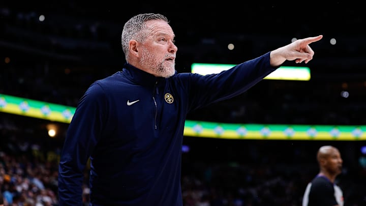 Mar 26, 2025; Denver, Colorado, USA; Denver Nuggets head coach Michael Malone in the second quarter against the Milwaukee Bucks at Ball Arena. Mandatory Credit: Isaiah J. Downing-Imagn Images