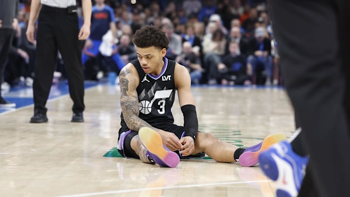 Jan 22, 2025; Oklahoma City, Oklahoma, USA; Utah Jazz guard Keyonte George (3) looks down after falling on a play against the Oklahoma City Thunder during the second half at Paycom Center. Mandatory Credit: Alonzo Adams-Imagn Images