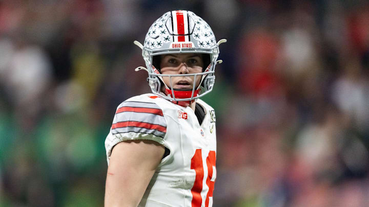 Jan 20, 2025; Atlanta, GA, USA; Ohio State Buckeyes quarterback Will Howard (18) against the Notre Dame Fighting Irish during the CFP National Championship college football game at Mercedes-Benz Stadium. Mandatory Credit: Mark J. Rebilas-Imagn Images