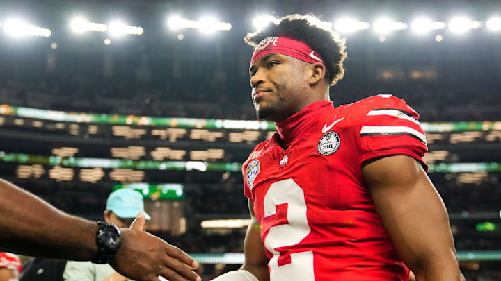 Ohio State Buckeyes defensive back Caleb Downs leaves the field following the Cotton Bowl at AT&T Stadium 
