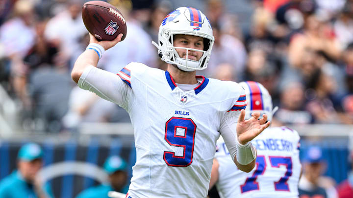 Buffalo Bills quarterback Kyle Allen (9) drops back to throw against the Chicago Bears during the second quarter at Soldier Field. 