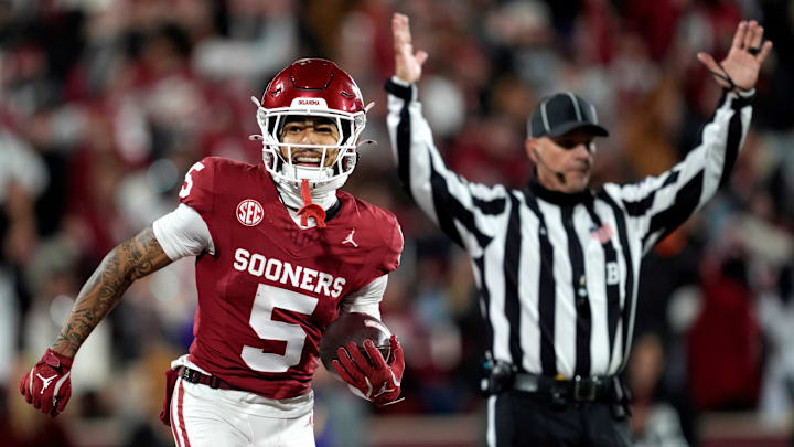 Oklahoma Sooners wide receiver Isaiah Sategna III (5) smiles as he scores a touchdown during a college football game between the University of Oklahoma Sooners (OU) and the LSU Tigers at Gaylord Family – Oklahoma Memorial Stadium in Norman, Okla., Saturday, Nov. 29, 2025. Oklahoma won 17-13.