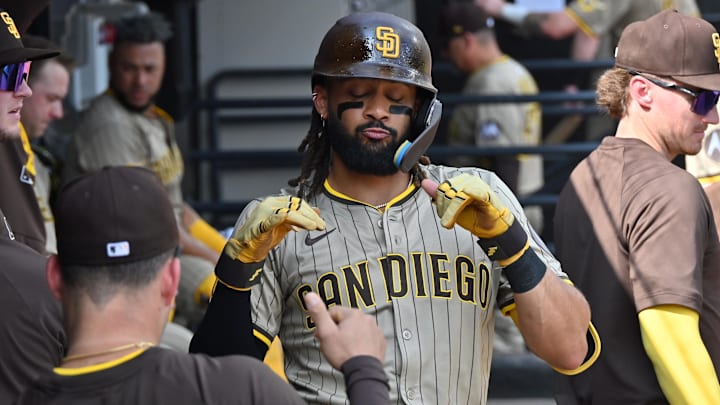 Sep 21, 2025; Chicago, Illinois, USA; San Diego Padres right fielder Fernando Tatis Jr. (23) celebrates his solo home run with teammates in the dugout against the Chicago White Sox during the third inning at Rate Field. Mandatory Credit: Patrick Gorski-Imagn Images