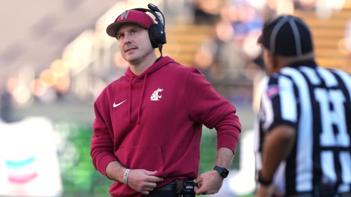 Nov 11, 2023; Berkeley, California, USA; Washington State Cougars head coach Jake Dickert stands on the field during the second quarter against the California Golden Bears at California Memorial Stadium. Mandatory Credit: Darren Yamashita-USA TODAY Sports Nov 11, 2023; Berkeley, California, USA; Washington State Cougars head coach Jake Dickert stands on the field during the second quarter against the California Golden Bears at California Memorial Stadium. Mandatory Credit: Darren Yamashita-USA TODAY Sports
