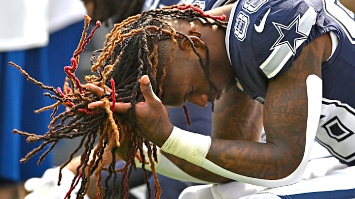 Dallas Cowboys wide receiver CeeDee Lamb sits on the bench before the start of the game against the Los Angeles Rams 