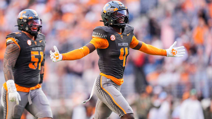 Tennessee defensive back Ty Redmond (4) and defensive lineman Jaxson Moi (51) celebrate after Redmond made an interception against New Mexico State during an NCAA college football game on November 15, 2025, in Knoxville, Tenn. Tennessee defensive back Ty Redmond (4) and defensive lineman Jaxson Moi (51) celebrate after Redmond made an interception against New Mexico State during an NCAA college football game on November 15, 2025, in Knoxville, Tenn.