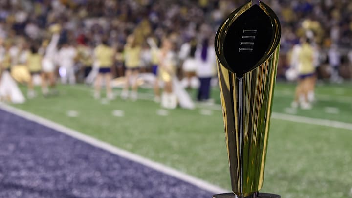 Nov 22, 2025; Atlanta, Georgia, USA; A view of the college football playoff national championship trophy on the sidelines of a game between the Georgia Tech Yellow Jackets and Pittsburgh Panthers in the first quarter at Bobby Dodd Stadium at Hyundai Field. Mandatory Credit: Brett Davis-Imagn Images
