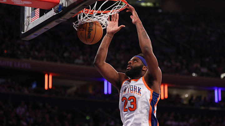 Mar 30, 2025; New York, New York, USA; New York Knicks center Mitchell Robinson (23) dunks the ball during the second half against the Portland Trail Blazers at Madison Square Garden. Mandatory Credit: Vincent Carchietta-Imagn Images