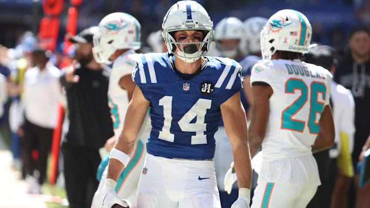 Sep 7, 2025; Indianapolis, Indiana, USA; Indianapolis Colts wide receiver Alec Pierce (14) celebrates after making a catch during the second half against the Miami Dolphins at Lucas Oil Stadium. Mandatory Credit: Trevor Ruszkowski-Imagn Images