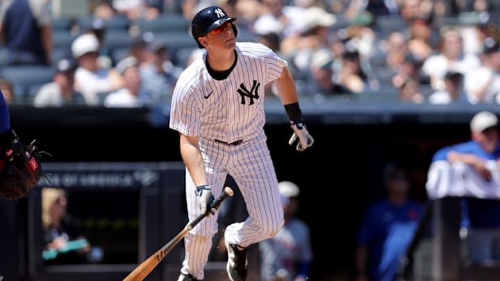 May 17, 2025; Bronx, New York, USA; New York Yankees second baseman DJ LeMahieu (26) follows through on a solo home run against the New York Mets during the third inning at Yankee Stadium. Mandatory Credit: Brad Penner-Imagn Images