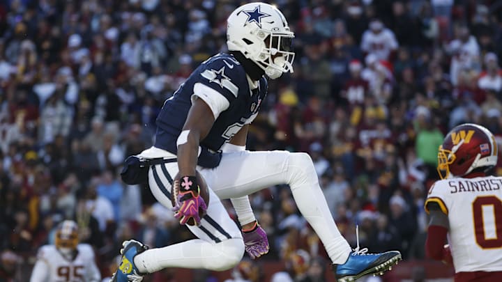Dallas Cowboys wide receiver George Pickens celebrates after a play against the Washington Commanders.