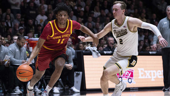 Dec 6, 2025; West Lafayette, Indiana, USA; Iowa State Cyclones guard Dominick Nelson (11) dribbles past Purdue Boilermakers guard Fletcher Loyer (2) during the first half at Mackey Arena. Mandatory Credit: Jacob Musselman-Imagn Images Dec 6, 2025; West Lafayette, Indiana, USA; Iowa State Cyclones guard Dominick Nelson (11) dribbles past Purdue Boilermakers guard Fletcher Loyer (2) during the first half at Mackey Arena. Mandatory Credit: Jacob Musselman-Imagn Images