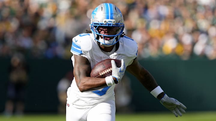 Detroit Lions running back Jahmyr Gibbs (0) runs with the ball against the Green Bay Packers during the second quarter at Lambeau Field. Detroit Lions running back Jahmyr Gibbs (0) runs with the ball against the Green Bay Packers during the second quarter at Lambeau Field.